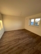 Moderne 2-Zimmer-Wohnung mit Südbalkon und Garage - Wohnecke
