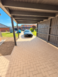 Erstbezug zum 01.12.2026 – Moderne Doppelhaushälfte mit Garten, Carport & Stellplatz - Carport