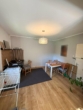 Einfamilienhaus mit viel Platz und Entwicklungspotenzial - Wohnzimmer