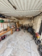 Einfamilienhaus mit viel Platz und Entwicklungspotenzial - Garage