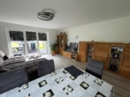 Neuwertige 3-Zimmer Wohnung mit Terrasse - Wohnzimmer