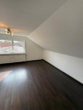 Gemütliche 2-Zimmer-Dachgeschosswohnung - Wohnzimmer