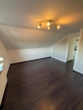 Gemütliche 2-Zimmer-Dachgeschosswohnung - Wohnzimmer