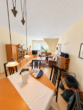 Großzügige 3-Zimmer-Wohnung mit Balkon & viel Stauraum in zentraler Lage von Loxstedt - Wohnzimmer