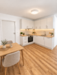 Erstbezug in Loxstedt-Nesse: Moderne 3-Zimmer-Wohnung mit überdachtem Balkon - Küche KI-Visualisierung