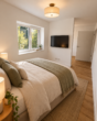 Erstbezug in Loxstedt-Nesse: Moderne 3-Zimmer-Wohnung mit überdachtem Balkon - Schlafzimmer KI-Visualisierung