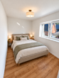 Erstbezug in Loxstedt-Nesse: Moderne 3-Zimmer-Wohnung mit überdachtem Balkon - Schlafzimmer KI-Visualisierung