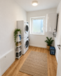 Erstbezug in Loxstedt-Nesse: Moderne 3-Zimmer-Wohnung mit überdachtem Balkon - Abstellraum KI-Visualisierung