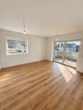 Erstbezug in Loxstedt-Nesse: Moderne 3-Zimmer-Wohnung mit überdachtem Balkon - Wohnzimmer