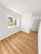 Erstbezug in Loxstedt-Nesse: Moderne 3-Zimmer-Wohnung mit überdachtem Balkon - Schlafzimmer