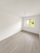 Erstbezug nach Sanierung – 3-Zi.-EG-Wohnung mit Westterrasse - Schlafzimmer