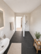 Erstbezug nach Sanierung – 3-Zi.-EG-Wohnung mit Westterrasse - Bad KI-Visualisierung